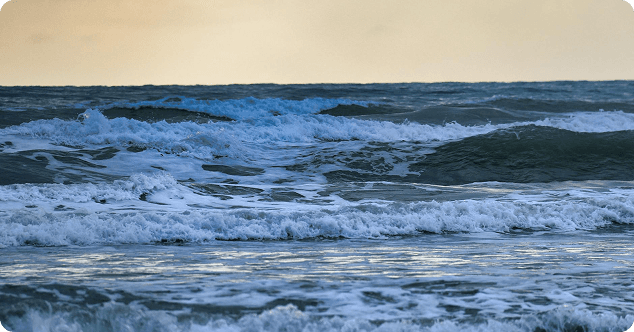 Ocean waves rolling onto the shore